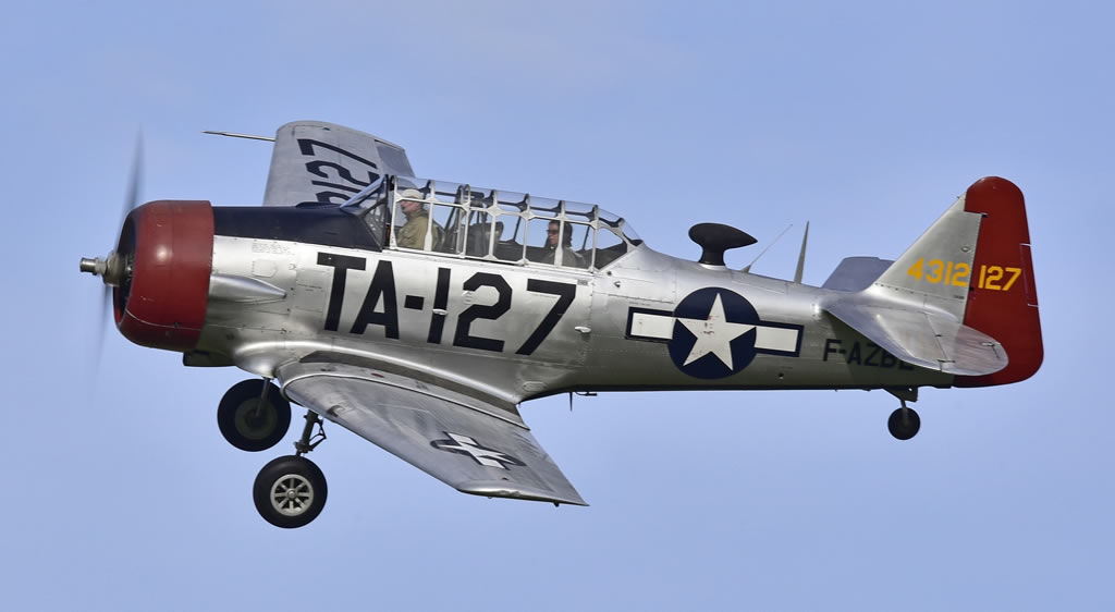 AT-6C Texan, Registration F-AZBE, in flight over Melun, France in 2019 AT-6C Texan, Registration F-AZBE, in flight over Melun, France in 2019